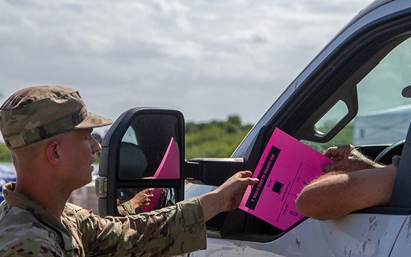 Florida Army National Guard mortarmen distribute emergency supplies after Hurricane Milton