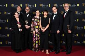 Tessa Ross, Peter Straughan, Edward Berger, Isabella Rossellini, Juliette Howell, Ralph Fiennes and Michael Jackman poses with the Outstanding British Film Award for 'Conclave'