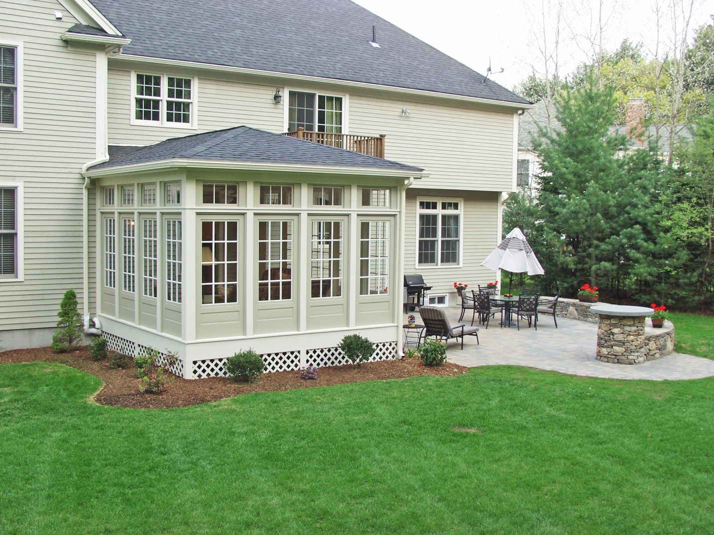 This-Sudbury-MA-3-season-room-was-built-using-doors-for-the-windows