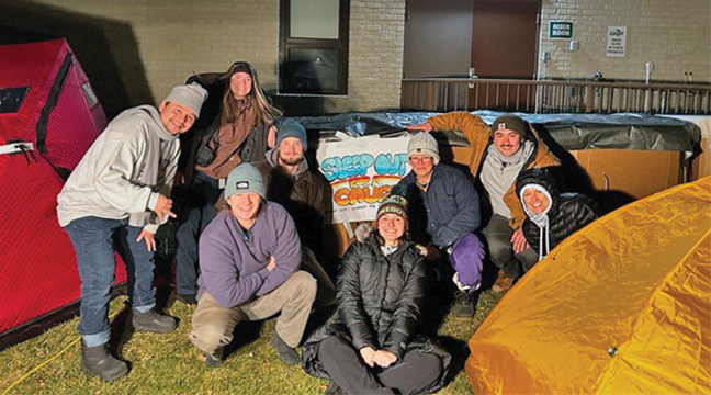 Pictured is the Cargill crew at the Sleep Out: Liz Kokesh, Louis Hyde, Madi Lindeman, DeDe Dahlheimer, Fe Nooa, Christian Garza, Chase Lehman and Mack Nelson. (Submitted Photo).