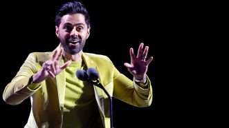 Hasan Minhaj performing stand-up comedy | Photo: Frazer Harrison/Getty