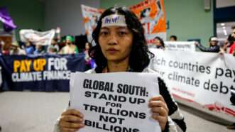 A protestor at the United Nations Climate Change Conference | Dominika Zarzycka/ZUMAPRESS/Newscom