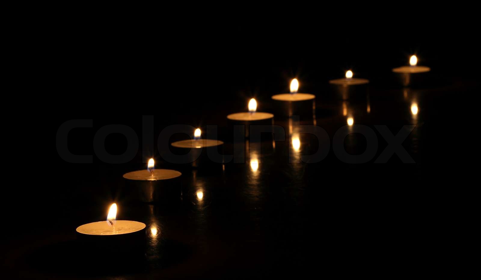 candles on a black background | Stock image | Colourbox