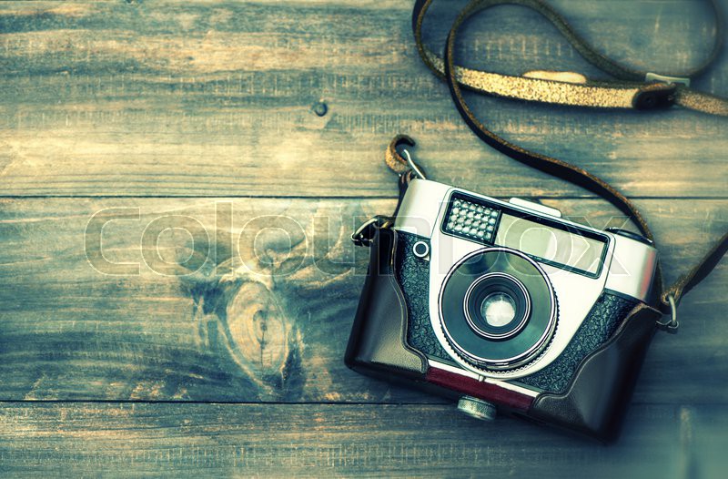 Old film camera. Vintage style toned picture with lens blur | Stock image |  Colourbox