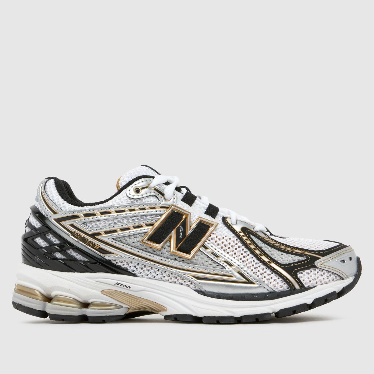 New Balance 1906r trainers in black & gold