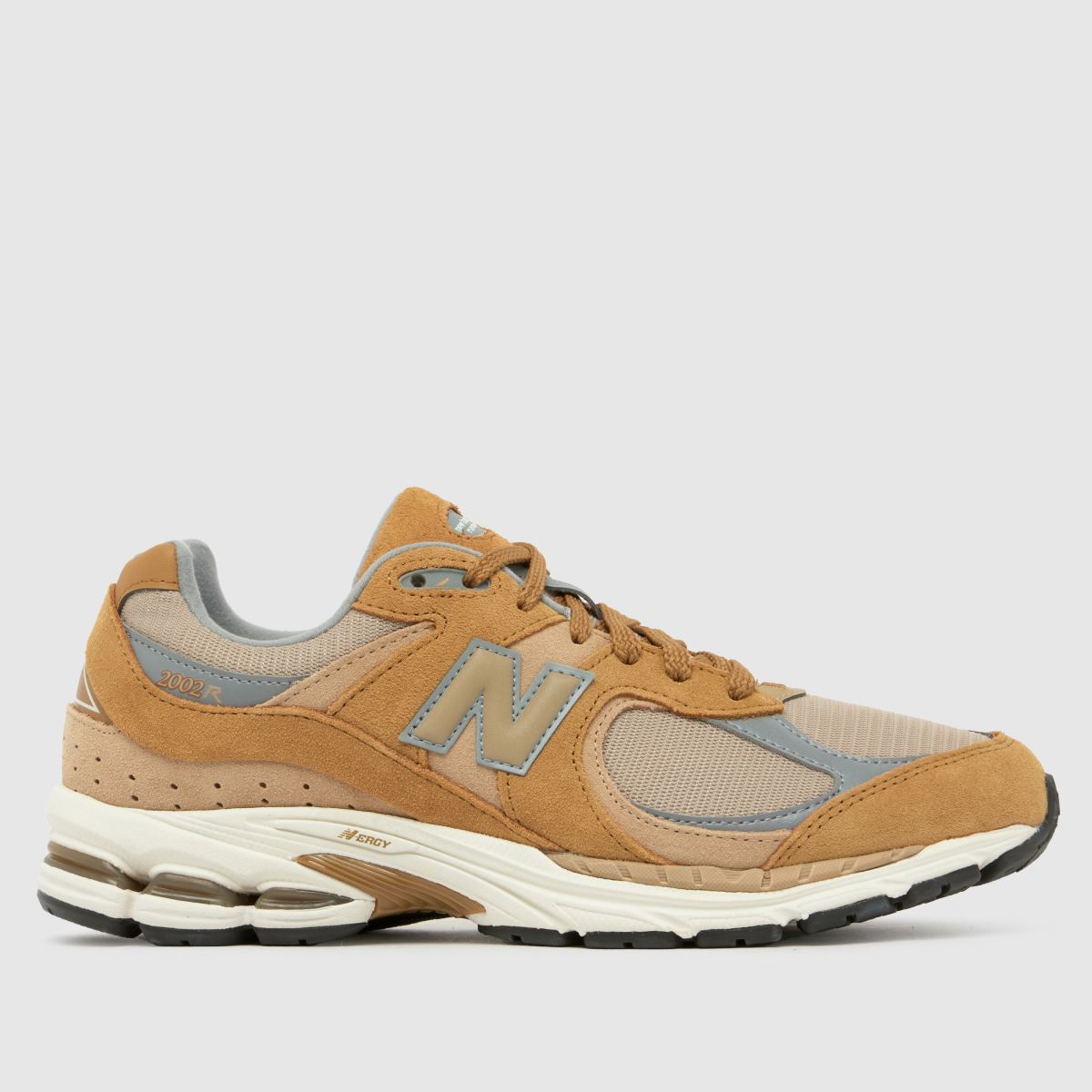 New Balance 2002r trainers in gold