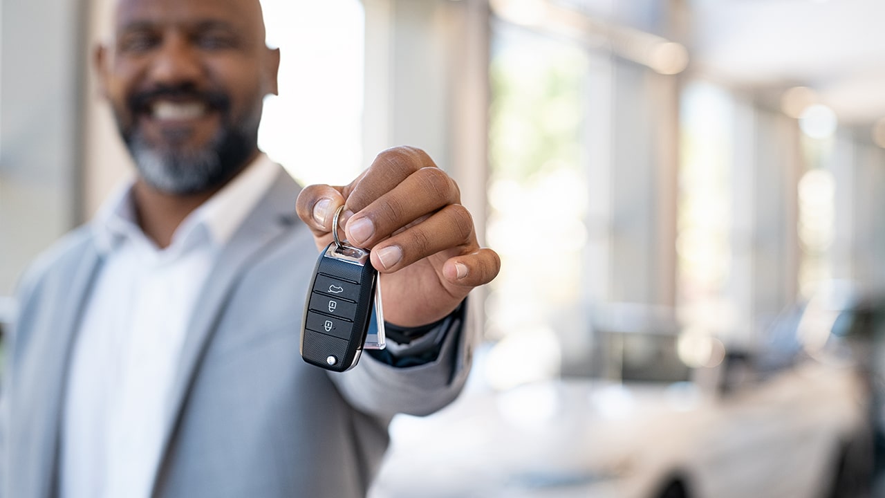 Sales man with car keys