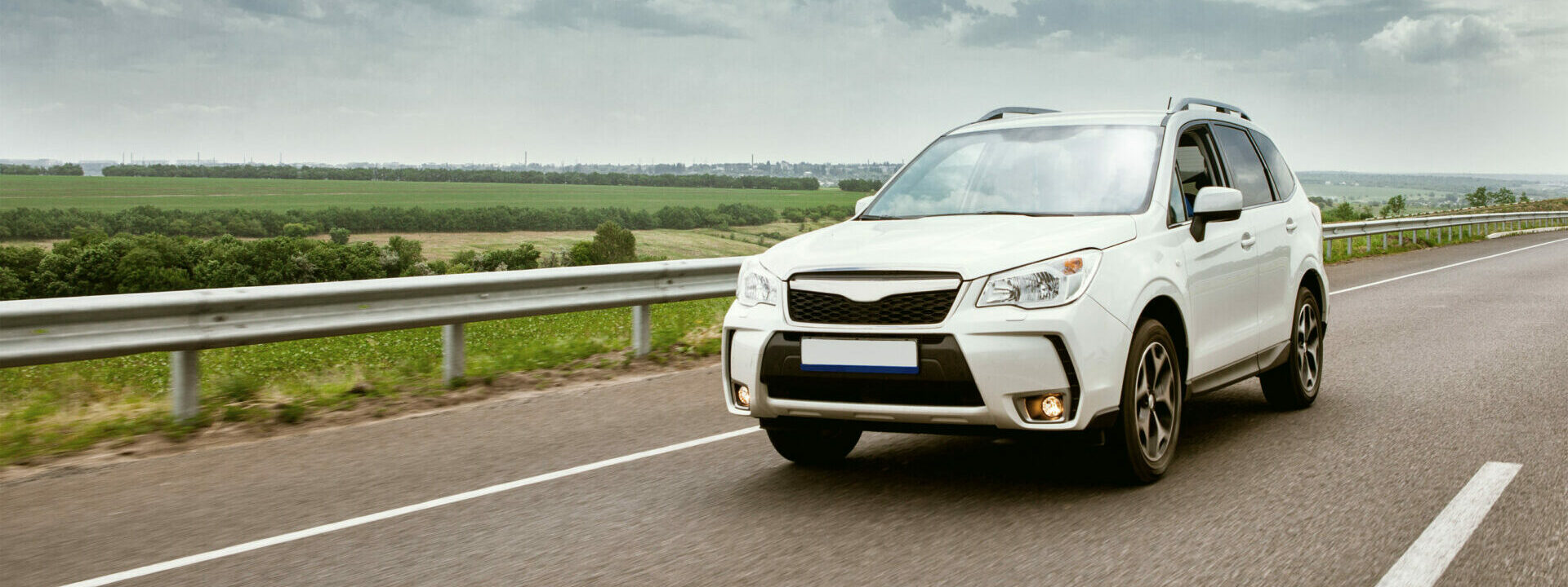 Modern new vehicle driving on the highway