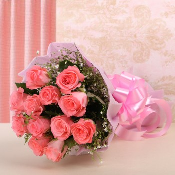 12 Pink Roses in Pink Paper