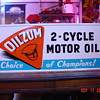 1960 Oilzum 2-Cycle Motor Oil Tin Sign...New Old Stock In Original Box