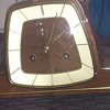 German 1970's clockwork clock with an Art Deco influence, wood, brass and other materials working condition.