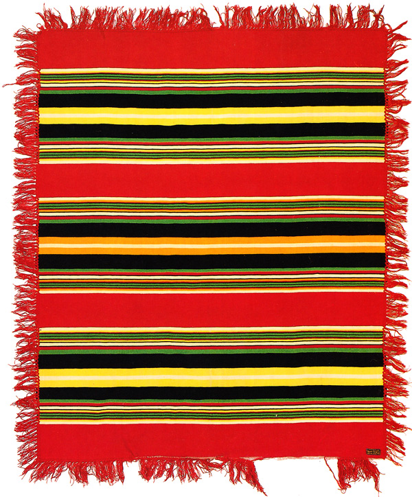 A Pendleton striped shawl from 1910-1915, labeled as pure fleece wool. Via "Language of the Robe."