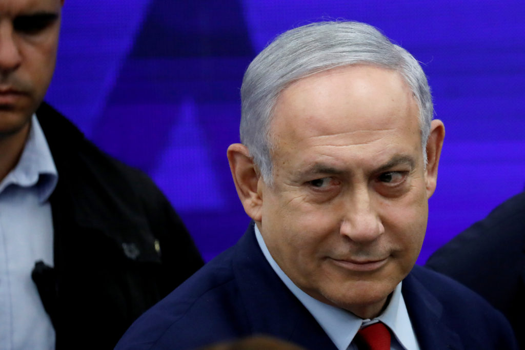 Israeli Prime Minister Benjamin Netanyahu looks on after delivering a statement in Ramat Gan, near Tel Aviv, Israel Septem...