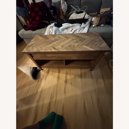 Used Rooms To Go Lift up Coffee Table  for sale on AptDeco