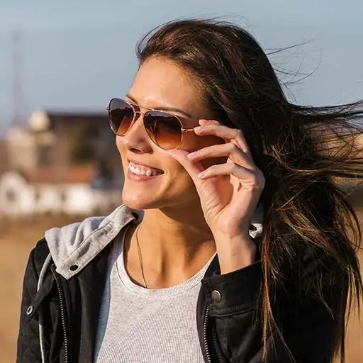 Woman wearing designer sunglasses