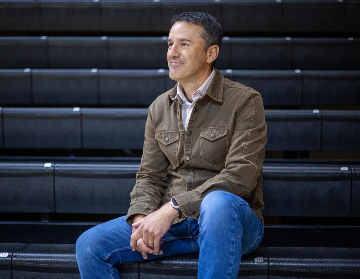 Joth Ricci, CEO of The System, poses for a photo in Gill Auditorium in Corvallis on Oct 28, 2024.