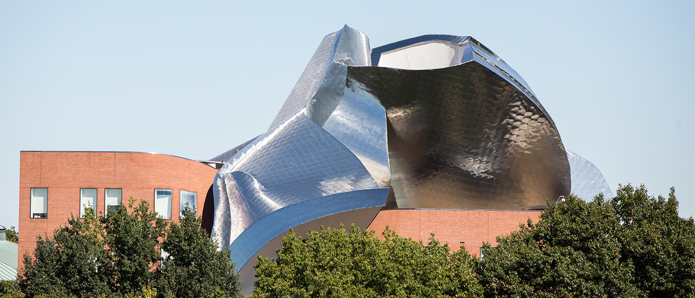 The exterior of the Peter B Lewis Building under a clear sky