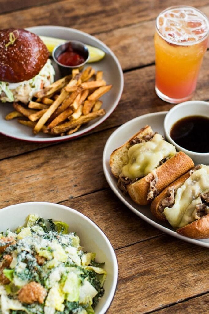 burger, fries and salad at culinary dropout scottsdale