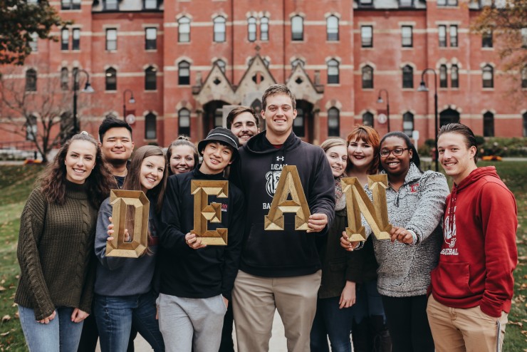 Students Holding DEAN sign