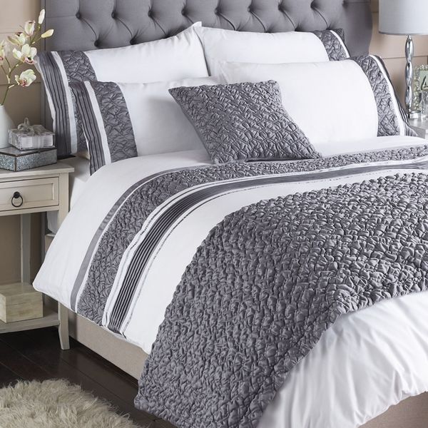 White grey bed duvet cover grey headboard white table