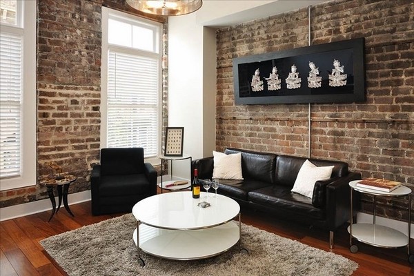 design interior ideas brick walls black leather sofa 