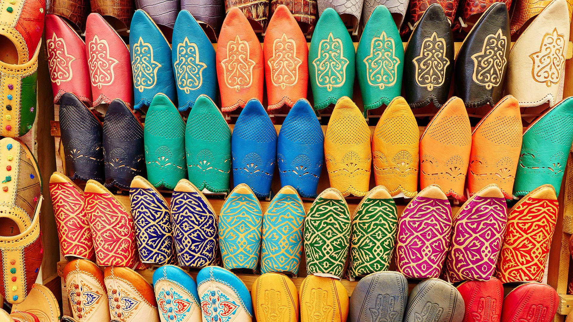 Colorful handmade leather slippers (babouches) on a market in Marrakech, Morocco © Ekaterina Pokrovsky/Shutterstock