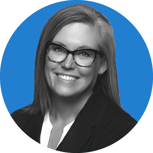 Headshot of Arizona Governor Katie Hobbs on a blue background.