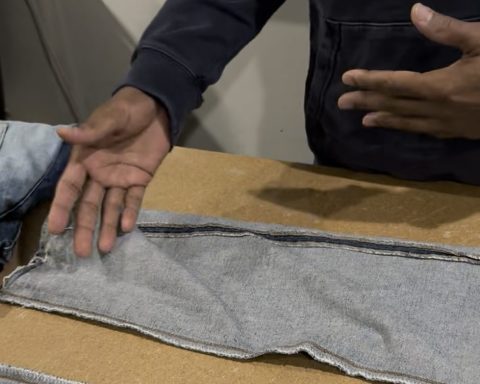 In a close-up of a jeans leg with twisting, denim designer Maurice Malone explains why a common denim issue is caused, either by shrinkage or improper sewing.