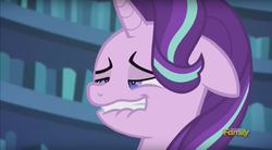 Size: 1413x778 | Tagged: safe, screencap, starlight glimmer, pony, unicorn, g4, my little pony: friendship is magic, the crystalling, blue eyes, book, bookshelf, discovery family, discovery family logo, faic, female, floppy ears, horn, lip bite, mare, nervous, out of context, solo, teeth, twilight's castle, unf, watermark