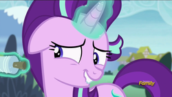 Size: 1366x768 | Tagged: safe, screencap, starlight glimmer, pony, g4, my little pony: friendship is magic, rock solid friendship, discovery family logo, female, glowing horn, horn, kite, lip bite, magic, mare, solo, telekinesis