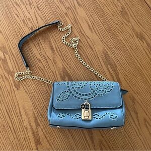 Blue crossbody purse with gold chain  and lace detail