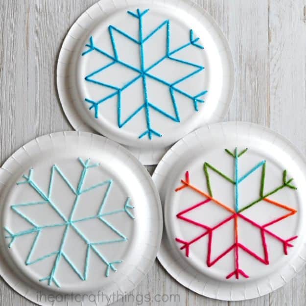 Inexpensive Pinterest Winter Crafts for Kids - Easy Craft Ideas for Children to Make At Home | Paper Plate Snowflake Yarn Art Project