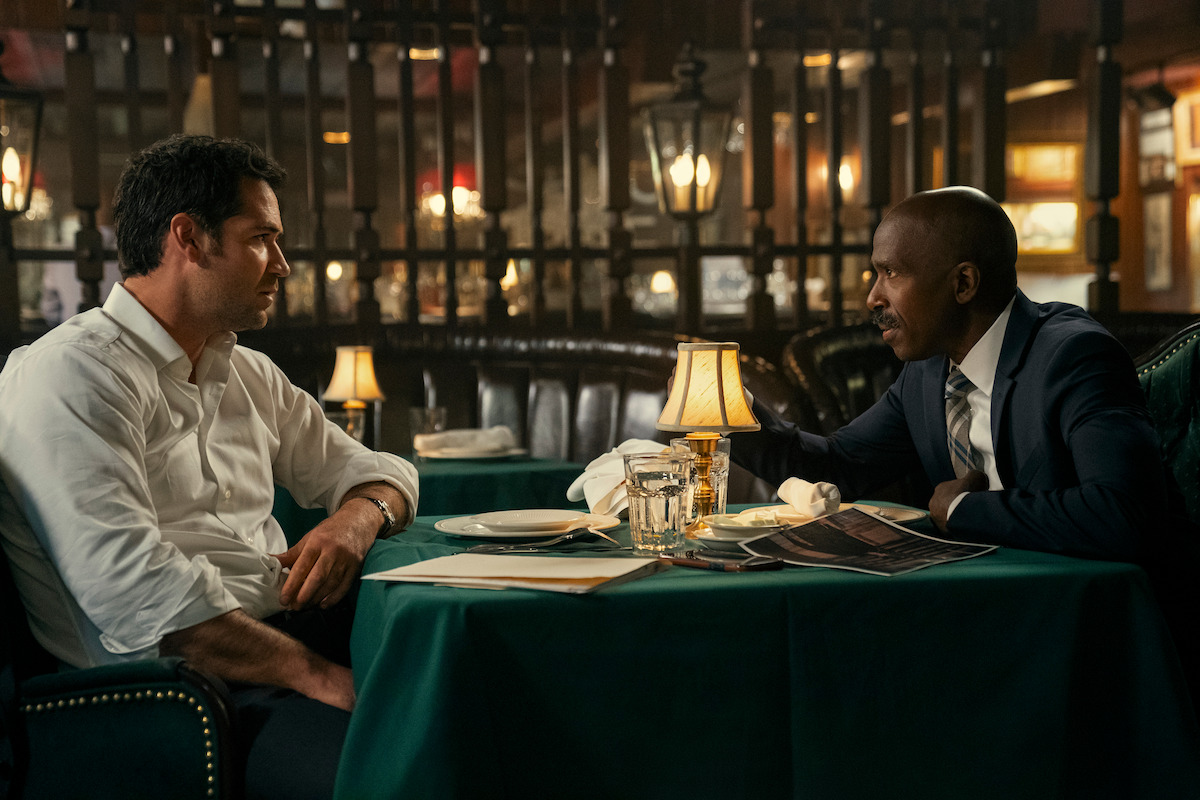 Manuel Garcia-Rulfo as Mickey Haller and Ntare Guma Mbaho Mwine as Detective Raymond Griggs in The Lincoln Lawyer Season 1.