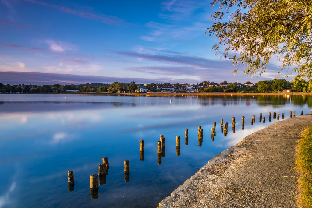 Boating lake in Poole Park on a clear calm evening