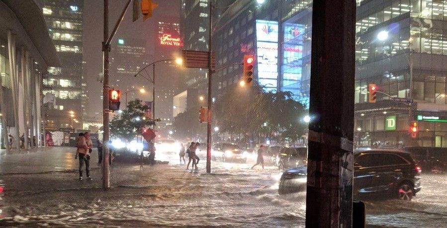 Two men rescued from flooded elevator last night with just a foot of air space left