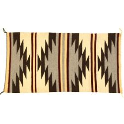 Small Navajo rug nicely woven with strips and