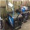 Image 2 : MILLER XMT 350 WELDER WITH ROLLING CART