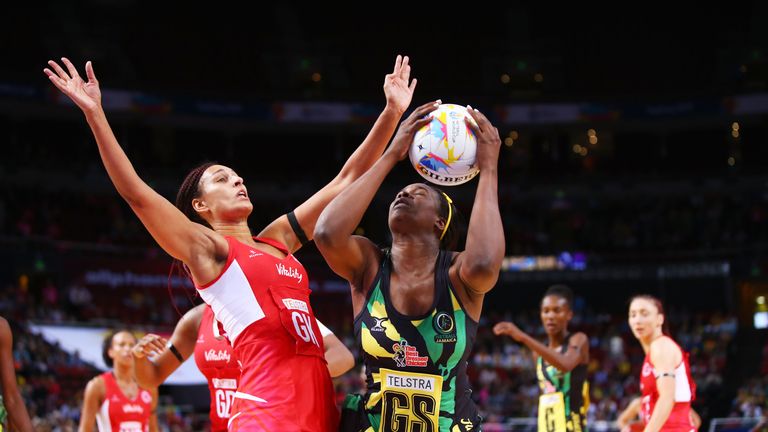 Romelda Aiken of Jamaica is challenged by Geva Mentor of England during the 2015 Netball World Cup match between England and Jamaica at Allphones Arena 