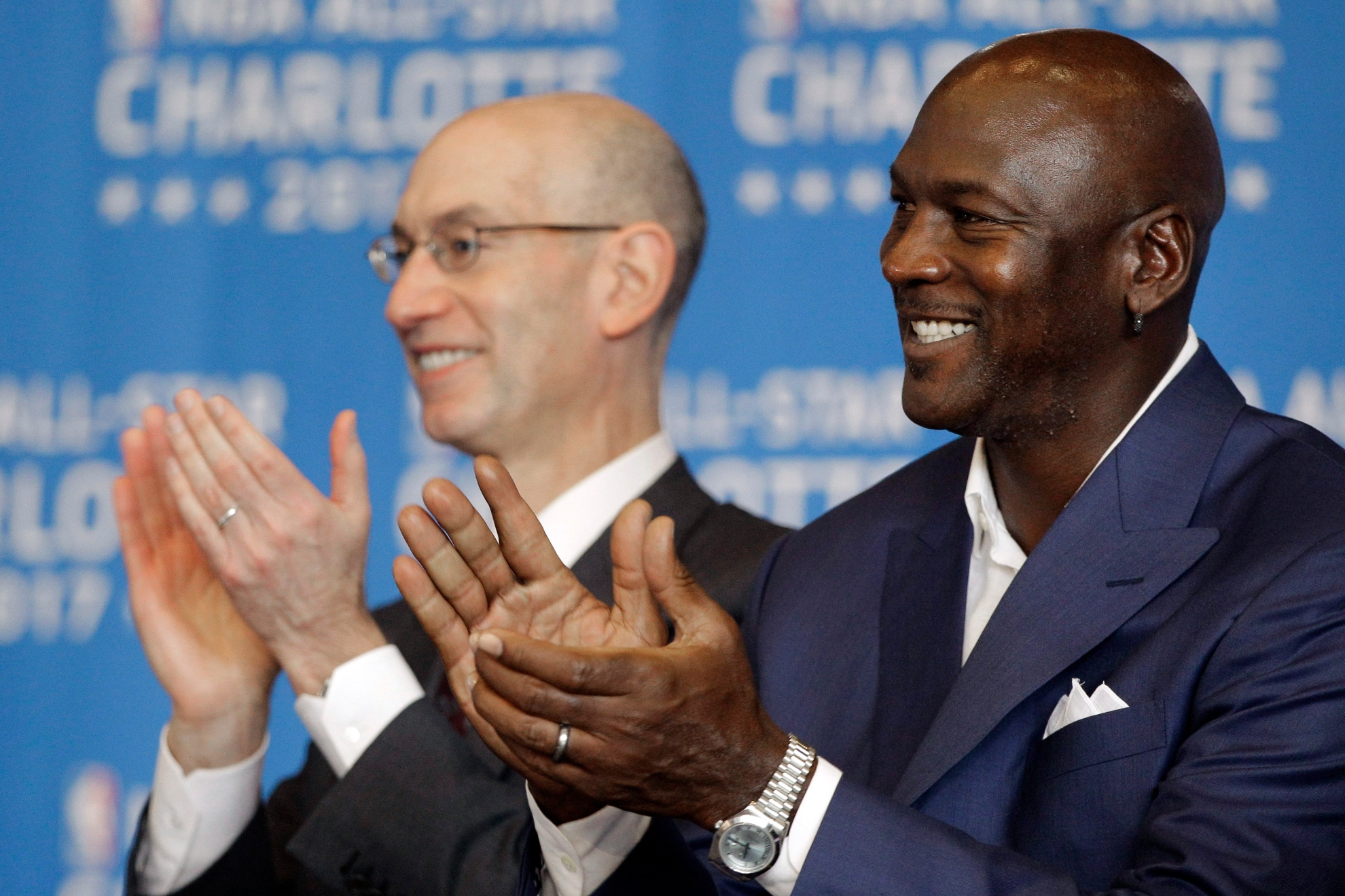 Charlotte Hornets owner Michael Jordan, right, and NBA Commissioner Adam Silver, left, applaud a speaker during a news conference, Tuesday, June 23, 2015, to announce Charlotte, N.C., as the site of the 2017 NBA All-Star basketball game.