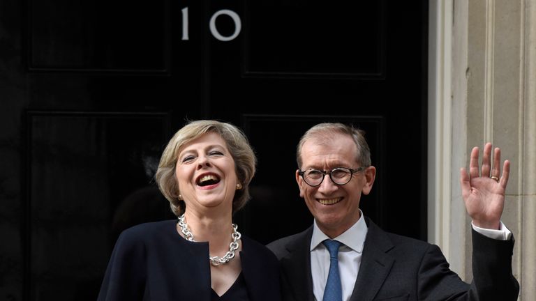 Prime Minister Theresa May and husband Philip May wave outside 10 Downing Street 