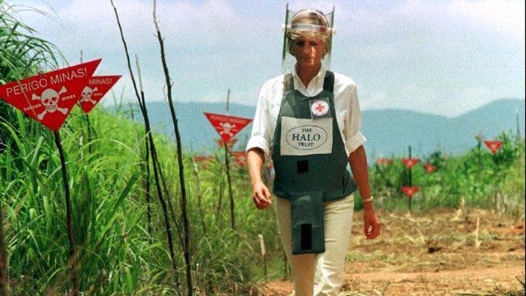 Jan 1997: Diana walks in a safety corridor of the landmine field in Huanbo, Angola during a visit to help a Red Cross campaign outlaw landmines worldwide