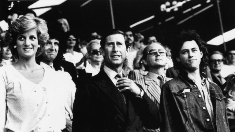 July 1985: Diana and Charles stand with Bob Geldof in the Royal Box at Wembley Stadium at the start of the Live Aid Transatlantic Spectacular 