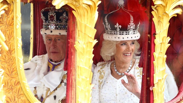 King Charles and Queen Camilla travel from Westminster Abbey in the Gold State Coach, following their coronation ceremony, in London, Britain May 6, 2023. REUTERS/Lisi Niesner TPX IMAGES OF THE DAY
