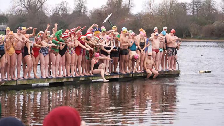 Swimmers gathered before the race in London this morning.