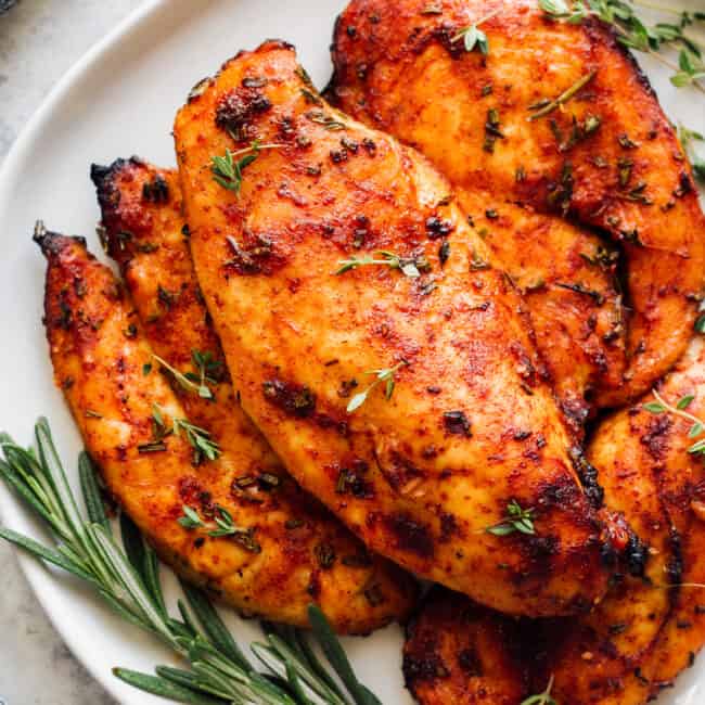 juicy baked chicken breast on plate