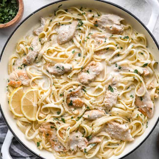 overhead view of chicken alfredo in a pan.