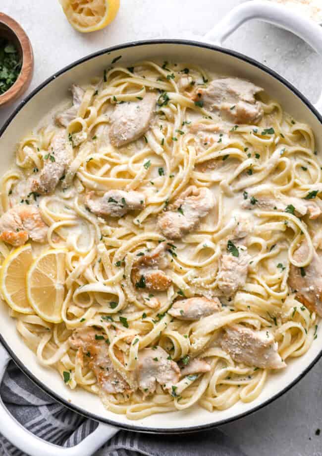 overhead view of chicken alfredo in a pan.