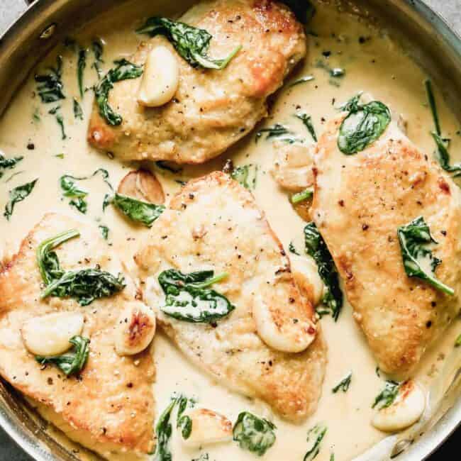 creamy garlic chicken in skillet