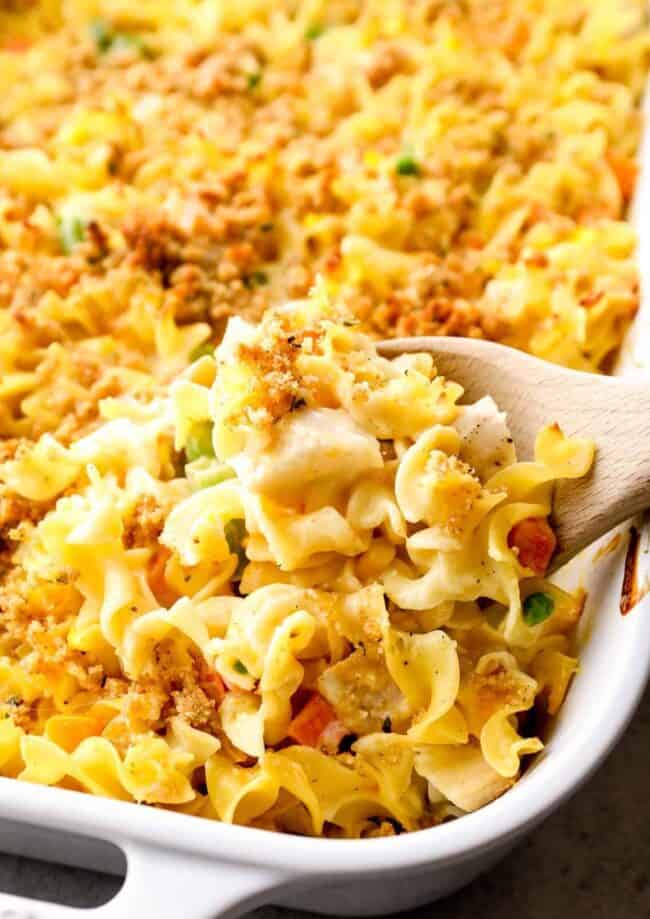 chicken noodle casserole with wooden spoon