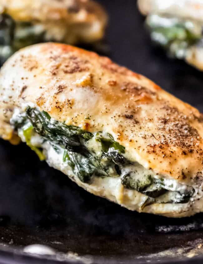 close up on chicken breast stuffed with spinach and cream cheese